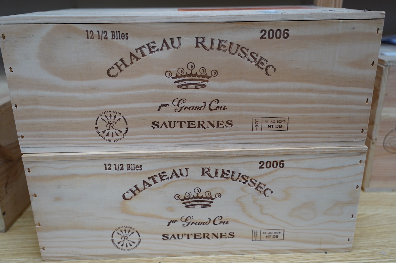 Two sealed cases of twelve half bottles (twenty-four bottles) of 2006 Chateau Rieussec, Sauternes, in OWC's, purchased en primeur from the wine society. Condition - good